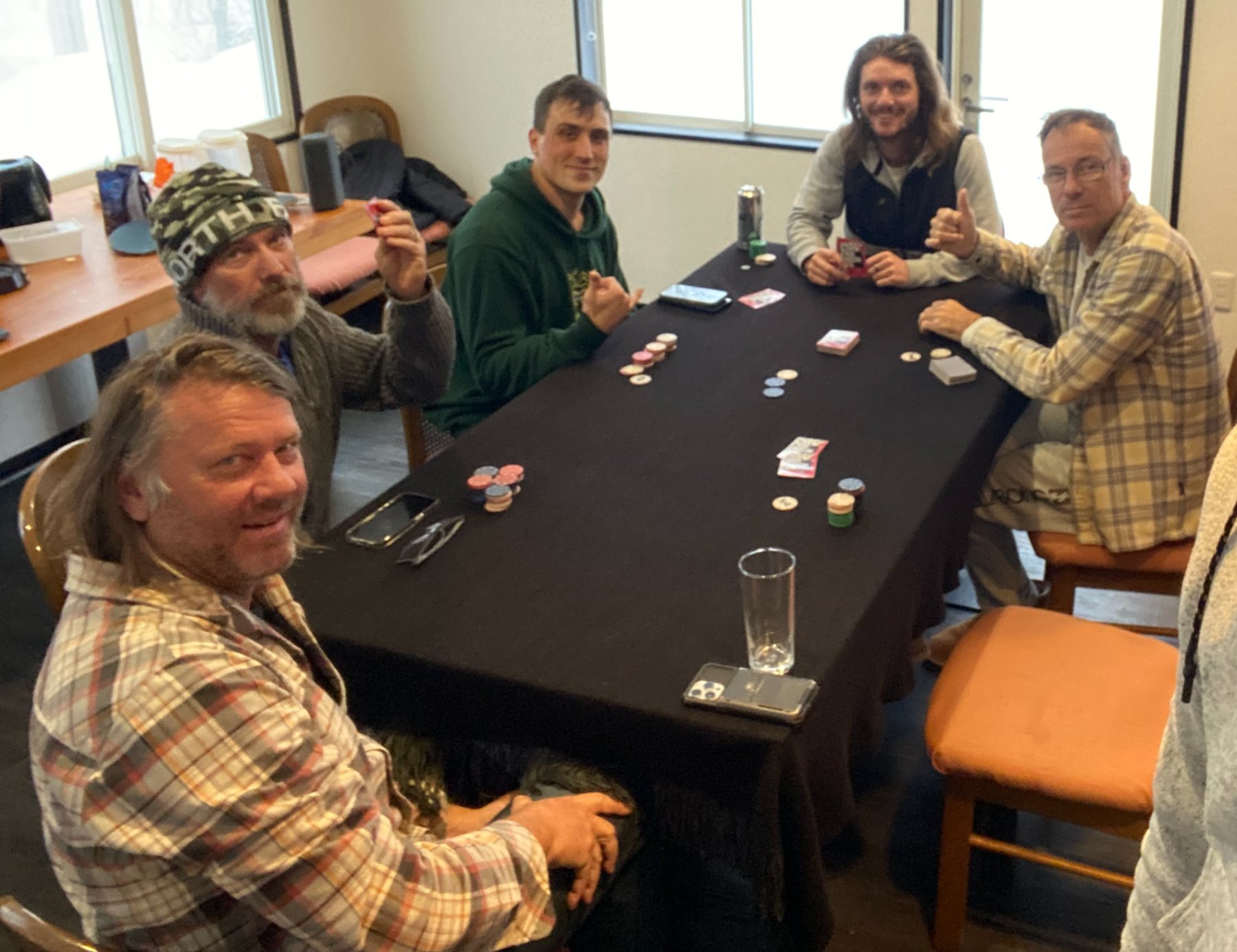 Guests playing cards at PowCow